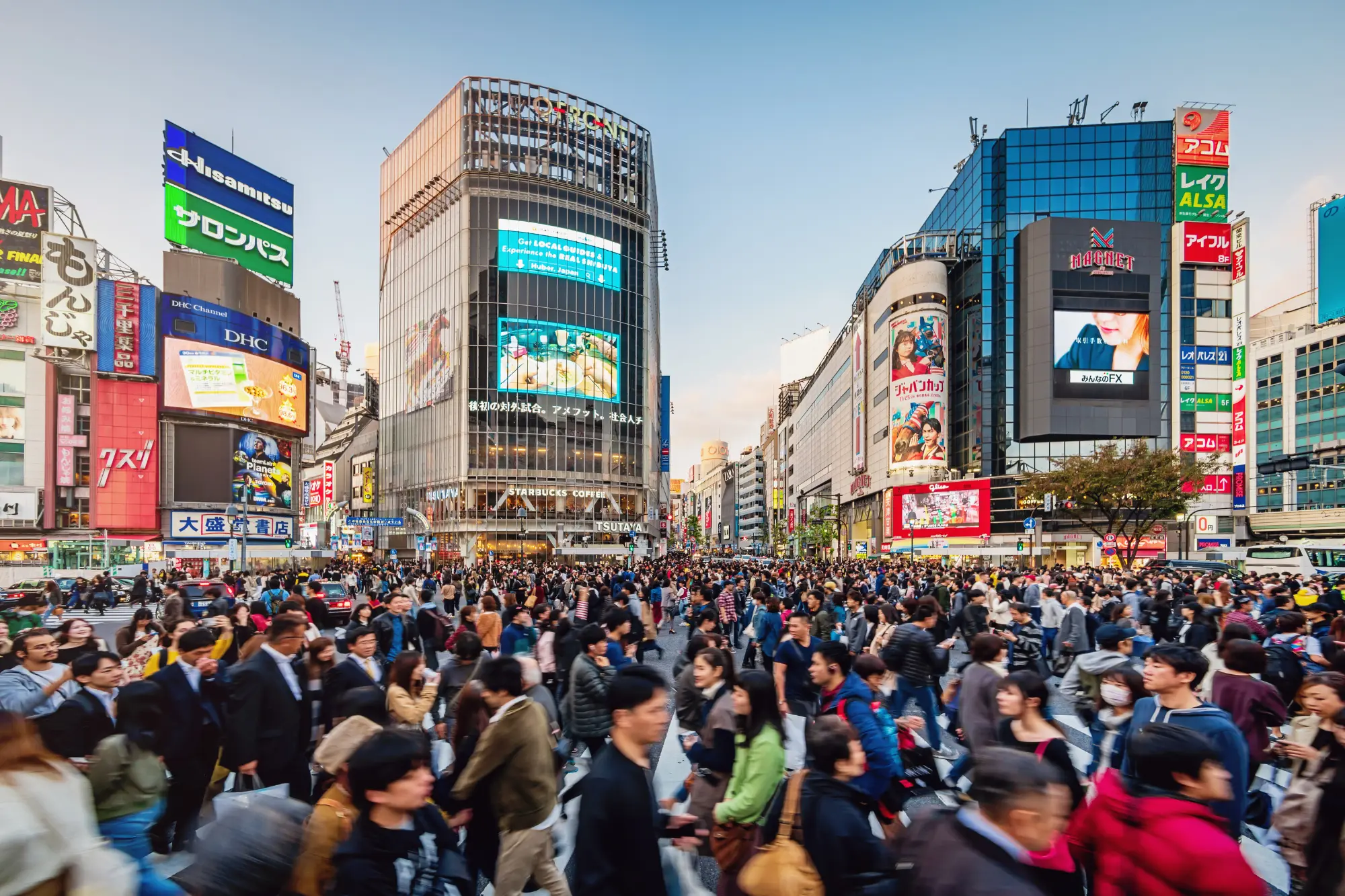 A bustling crowd of pedestrian tourists and locals